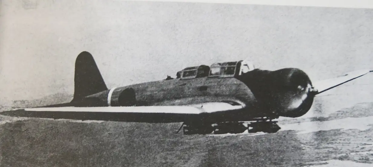 Black and white photograph of WWII fighter plane on the tarmac.