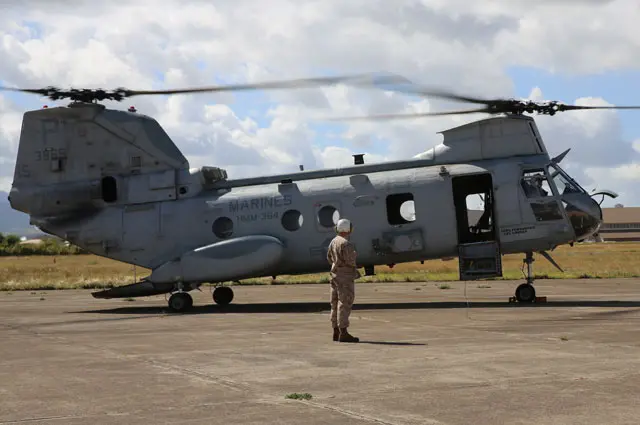 Photograph of Boeing-Vertol CH-46E Sea Knight taking off.