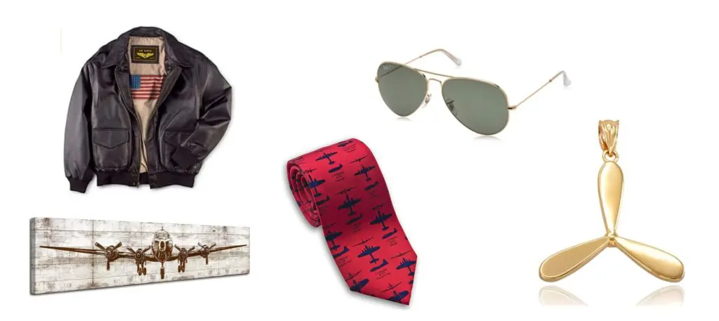 Photograph of aviation themed gifts for spouse. Includes leather pilot jacket, tie, aviator sun glasses, propeller charm.