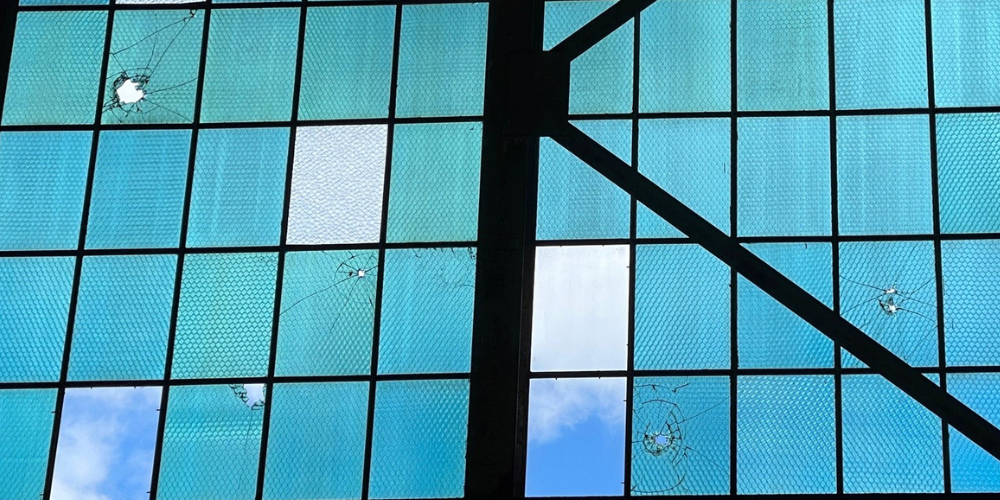 Bullet holes in the windows of Hangar 79 from December 7, 1941 attack on Pearl Harbor. 