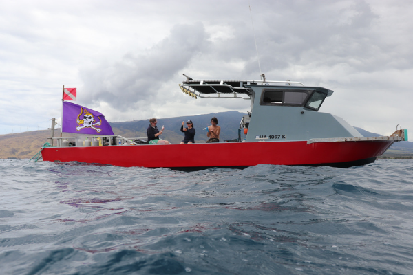 Dominic and colleagues on research boat.