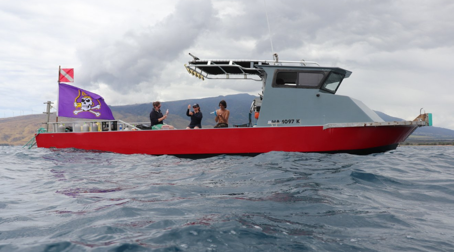 Dominic and colleagues on research boat.