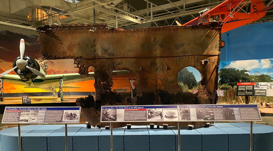 Photograph of a piece of the USS Arizona at PHAM.
