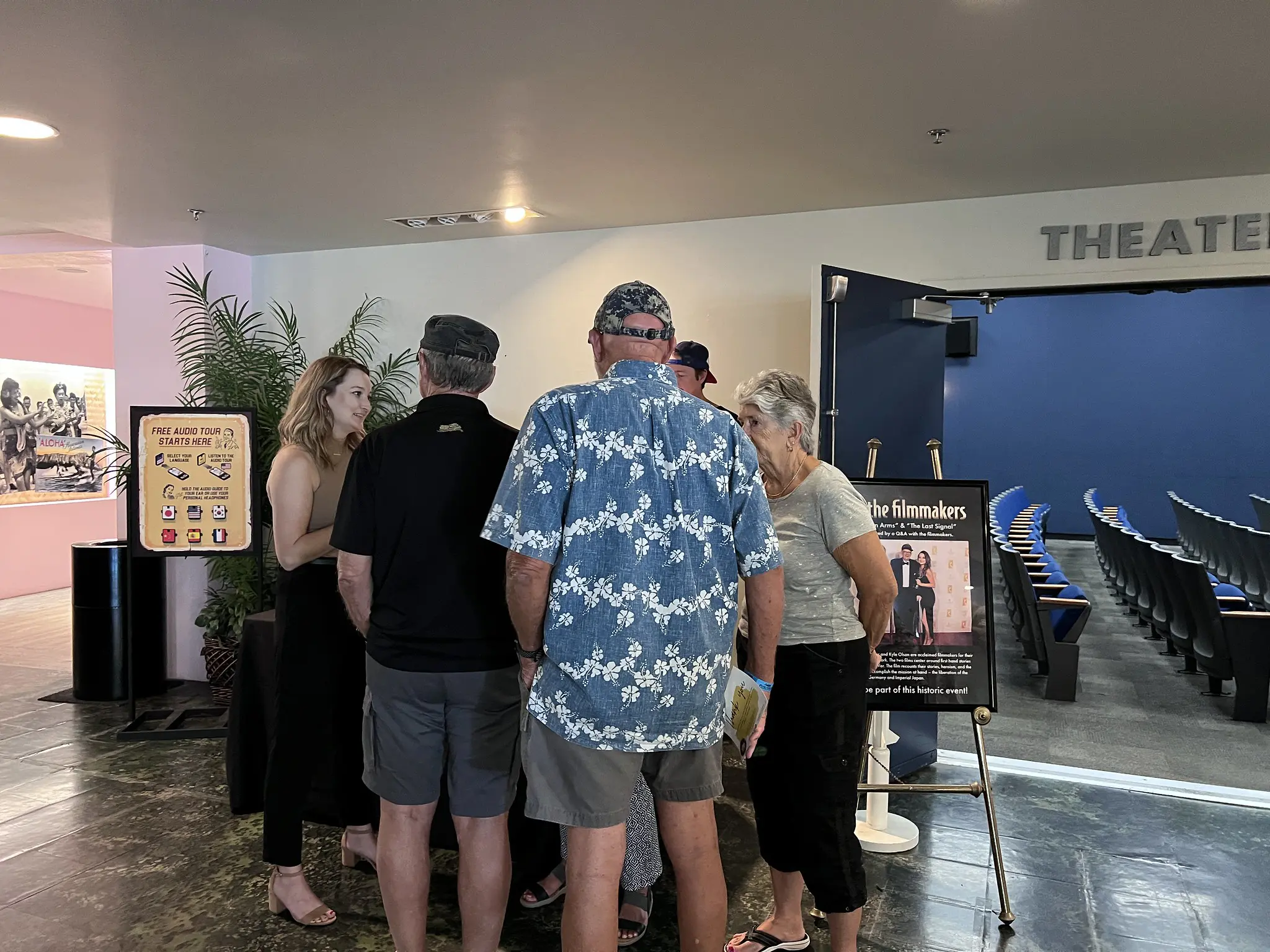 Photo of adults touring the Pearl Harbor Aviation Museum