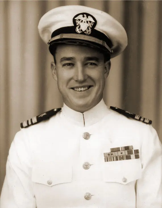 Jack_Sheretz Vintage photograph of a young Lieutenant Jack Sheretz smiling and wearing a decorated white uniform