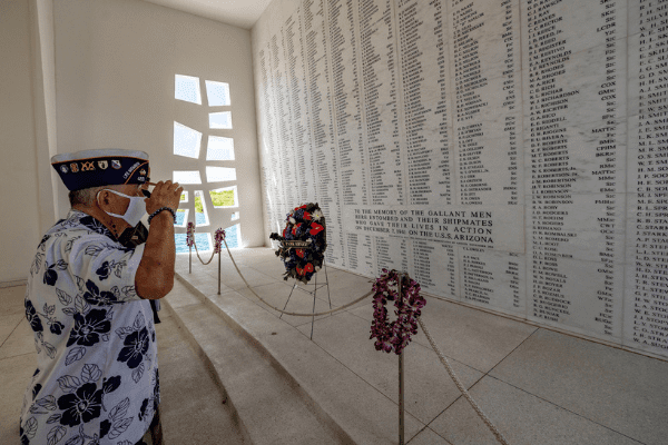 Untitled design (30) Henry Lee renders honors in the USS Arizona shrine room.