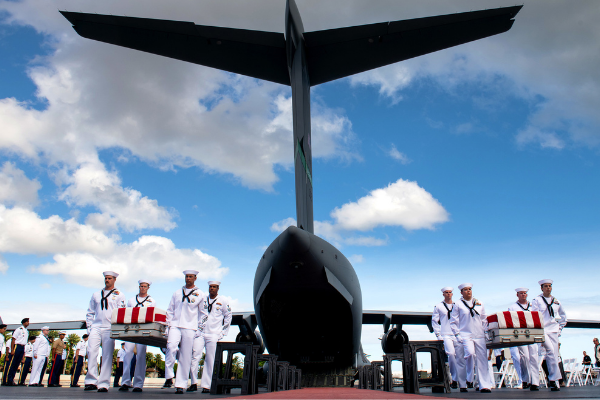 Honorable carry as the remains of USS Oklahoma Sailors and Marines return to Hawaii.