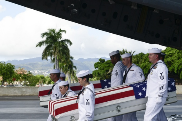 U.S. Navy Sailors carrying remains of USS Oklahoma unknowns.