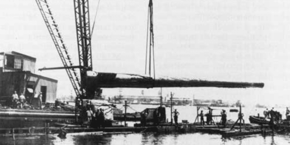 Untitled design (16) Gun turrets being removed from the USS Arizona shortly after the attack.