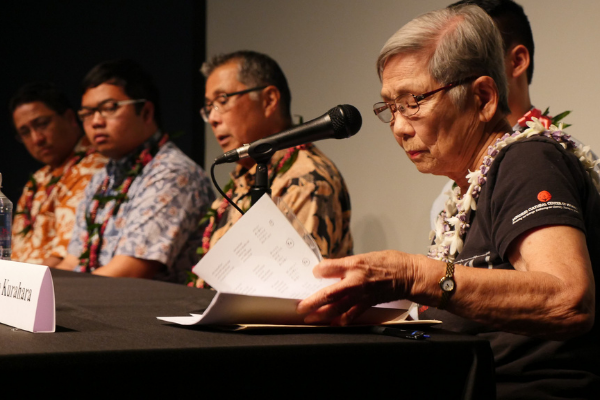 Panelists discussing with Hawaii students and families about how fear and prejudice alter the balance between citizens’ rights and the state.