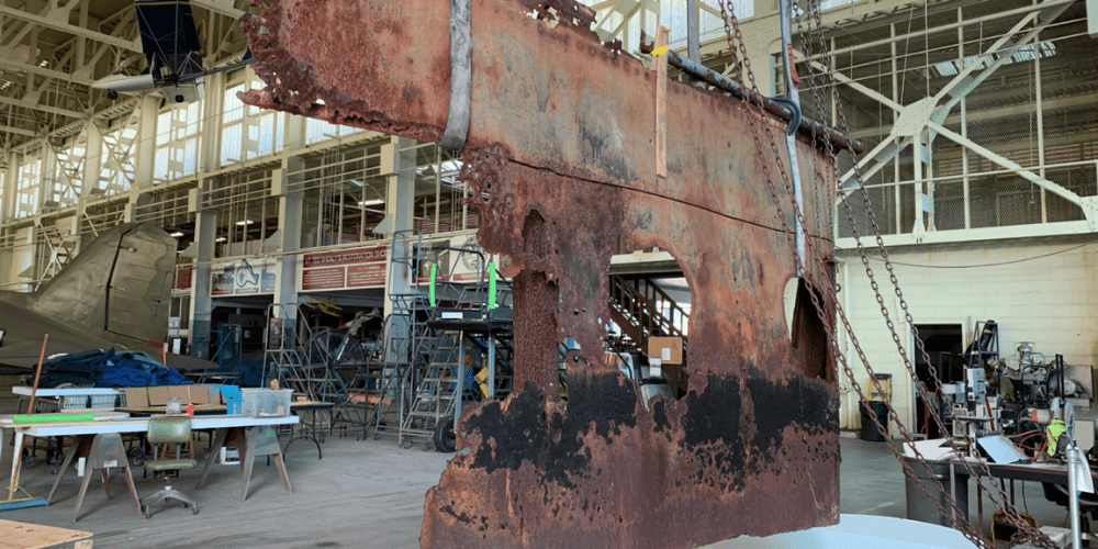 Untitled design (30) USS Arizona Relic in the Shealy Restoration Shop as the exhibit is designed and created.