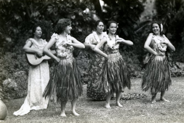 Luau celebration in the 1940s, full of food, dance, and music.