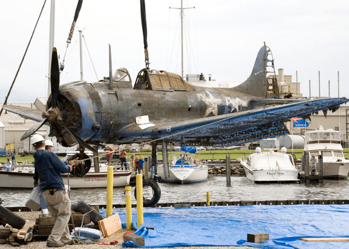 Untitled design - 2021-12-08T131406.898 Our Douglas Dauntless was lifted from Lake Michigan, Chicago on June 19, 2009.