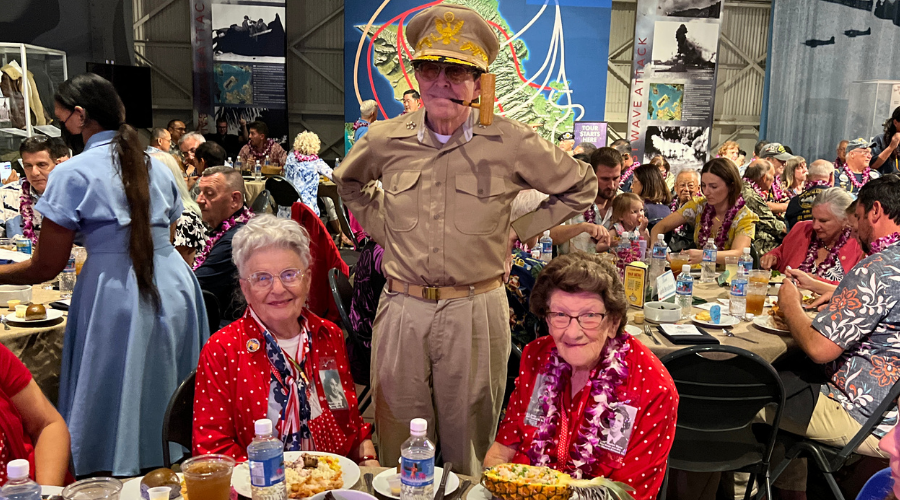 Mae Krier and Marian Wynn with "General MacArthur" at Liberty Luau at Pearl Harbor.