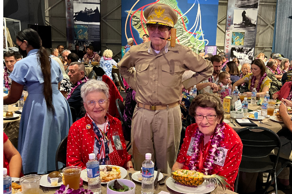 Mae Krier and Marian Wynn with "General MacArthur" at Liberty Luau at Pearl Harbor.