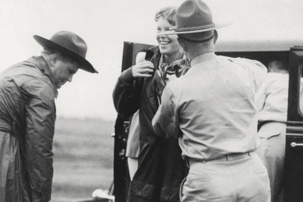 Amelia Earhart Mobile 4 Earhart dons her flight suit at Wheeler airfield before departing on January 11, 1935. Hawaii Department of Transportation Airport Division Image.