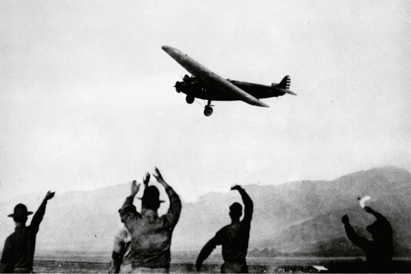 Amelia Earhart Mobile 7 “Bird of Paradise” landing at Wheeler Field after completing the first non-stop flight from California to Hawaii.