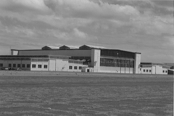 Untitled design - 2022-01-27T101020.411 Hangar 79 after the December 7, 1941 attack on Pearl Harbor.