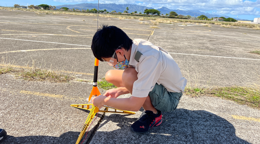 Boy Scouts participating in Space Exploration Merit Badge program at Pearl Harbor Aviation Museum.