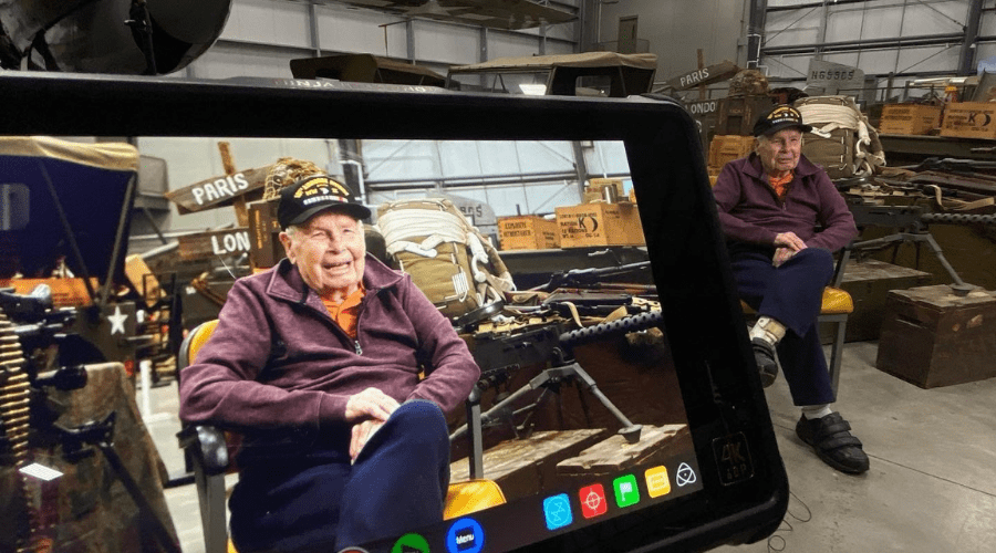 Volunteer (1) World War II Veteran, Dick Klein, of the 101st Airborne Division during filming of "A Rendezvous with Destiny."