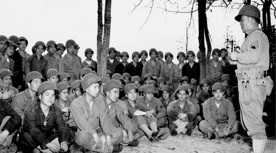 Untitled design 100th Infantry soldiers receiving training in 1943.
