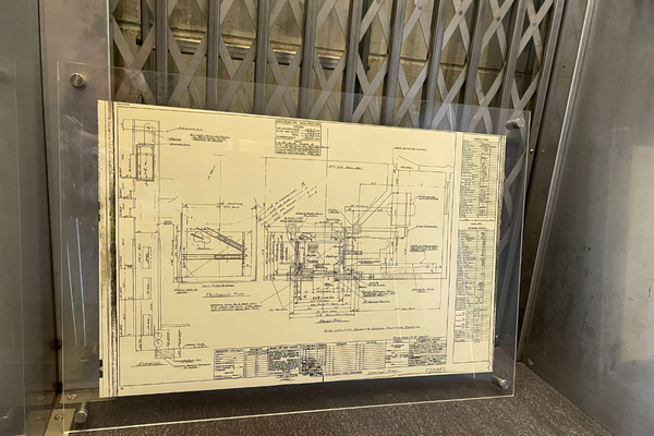 Preserved elevator plans inside historic elevator. 