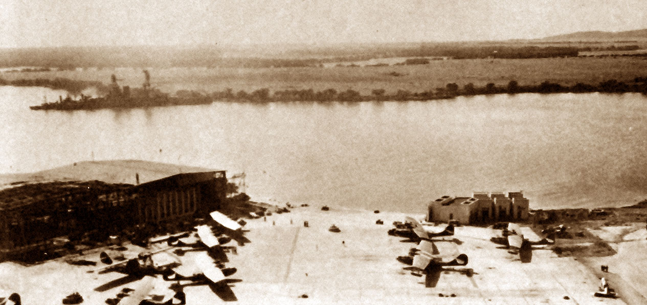 WWII-SEPIA-Dec-7-Damage-to-hangar-and-planes-at-seaplane-ramp-Ford-Island