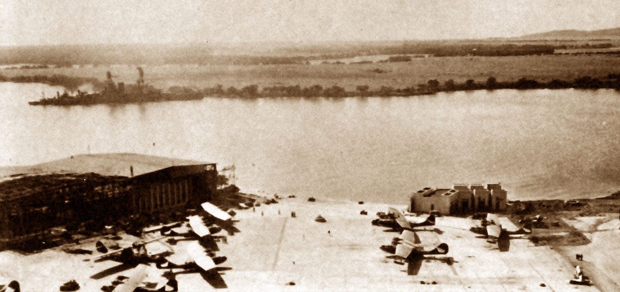 WWII-SEPIA-Dec-7-Damage-to-hangar-and-planes-at-seaplane-ramp-Ford-Island WWII-SEPIA-Dec-7-Damage-to-hangar-and-planes-at-seaplane-ramp-Ford-Island