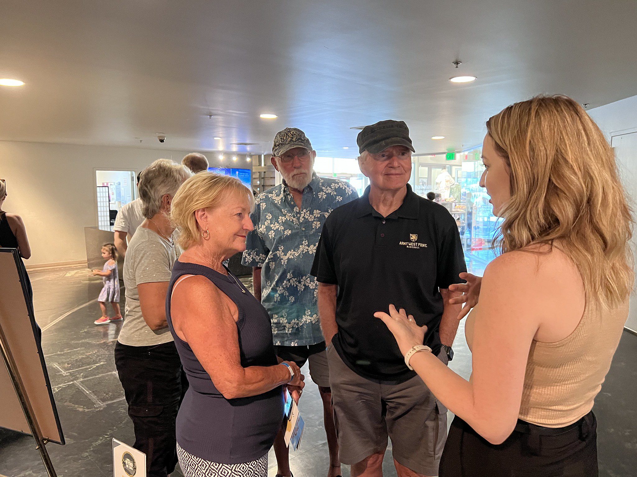 Group of Adults touring the Pearl Harbor Aviation Museum
