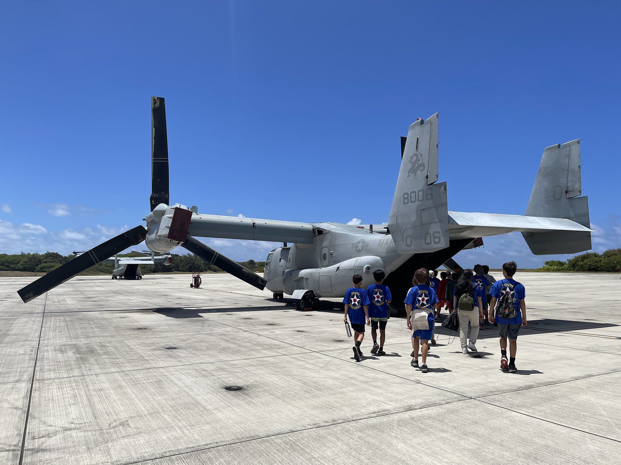 2023 Flight School for Boys walking to large plane